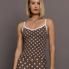 Model is wearing the Polka Dot Ruched Tank in Carafe White Polka Dot, front view.
