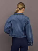 Back view of Crop Denim Jacket with Jewel Buttons in Dark Wash showing yoke and panel detail.