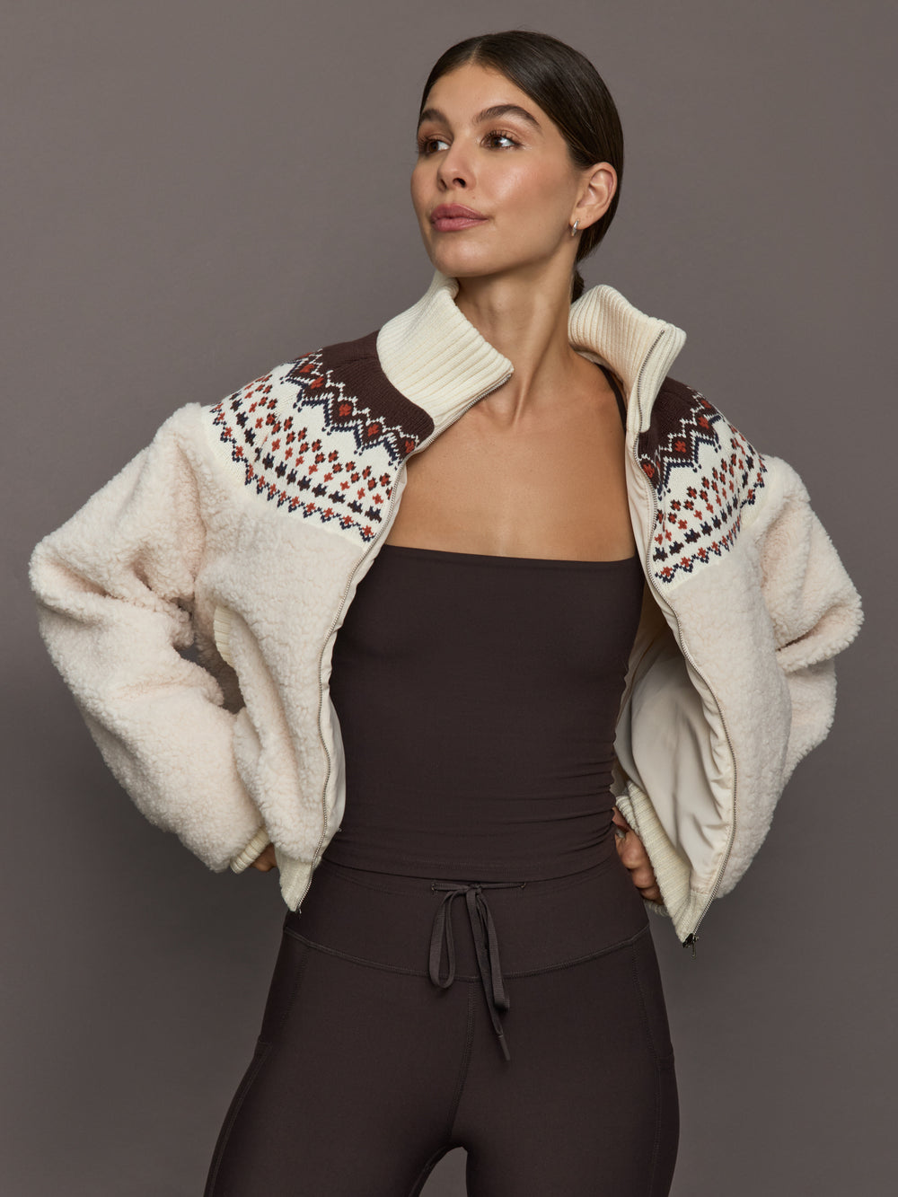 Fairisle Sherpa Jacket in natural cream sherpa, styled open to show ribbed knit collar and hem.
