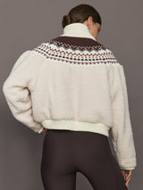 Fairisle Sherpa Jacket in natural off-white sherpa with multicolor Fairisle knit yoke, ribbed hem and cuffs, back view.