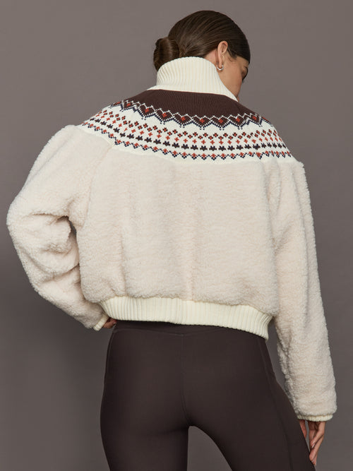 Fairisle Sherpa Jacket in natural off-white sherpa with multicolor Fairisle knit yoke, ribbed hem and cuffs, back view.