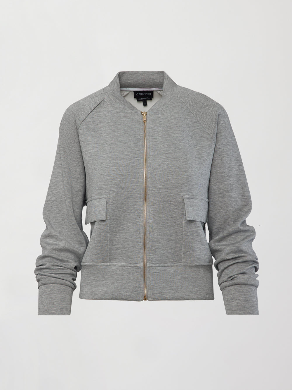 Ultrasoft Bomber Jacket in heather grey with gold zip closure and front flap pockets, product shot on white background, front view.