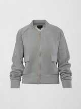 Ultrasoft Bomber Jacket in heather grey with gold zip closure and front flap pockets, product shot on white background, front view.