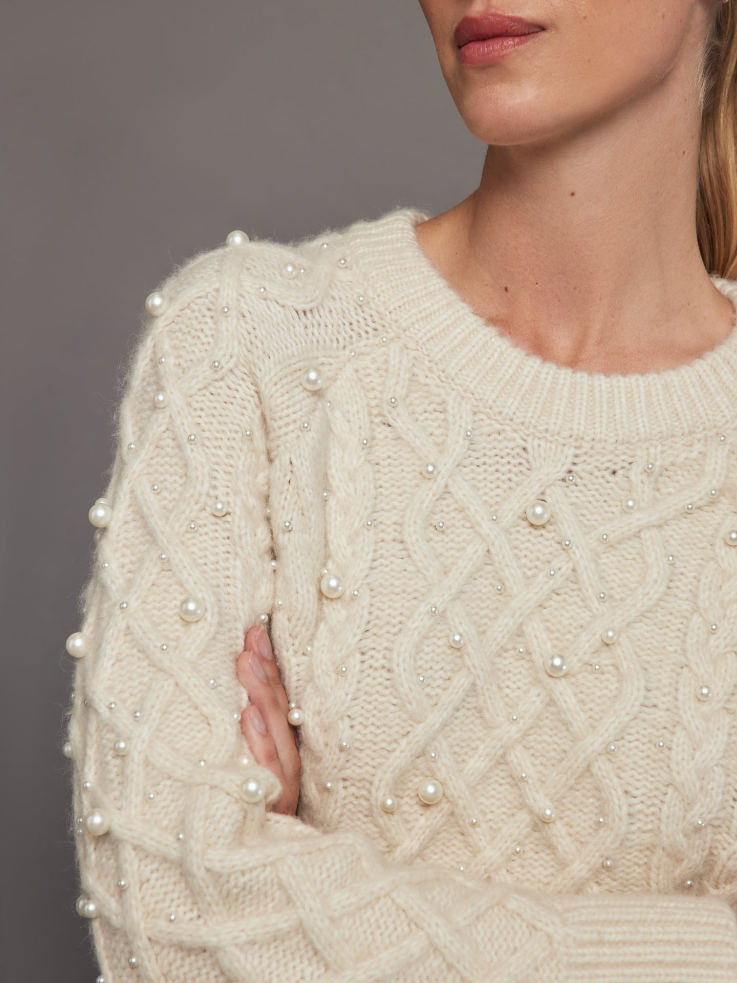 White jumper with clearance pearls