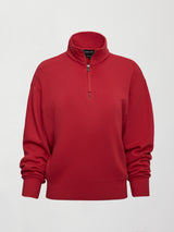 Image of a fire engine red long sleeve half zip sweatshirt. 