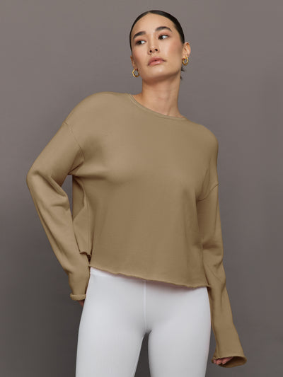 Model is wearing Crew Neck Sweatshirt in French Terry Chinchilla, front view.