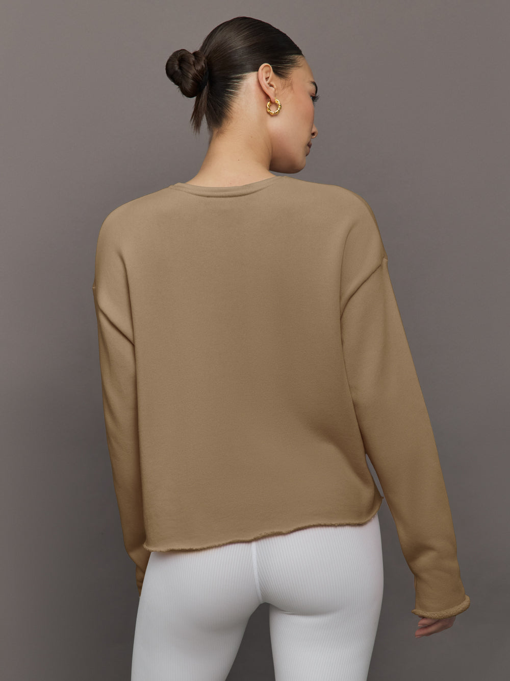 Back view of Crew Neck Sweatshirt in French Terry Chinchilla on model.