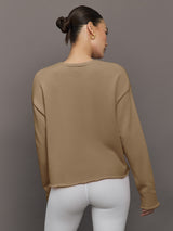 Back view of Crew Neck Sweatshirt in French Terry Chinchilla on model.