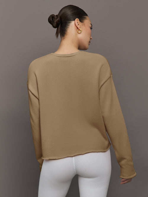 Back view of Crew Neck Sweatshirt in French Terry Chinchilla on model.