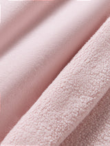 Fabric detail close-up of lotus French Terry sweatshirt soft cozy texture.