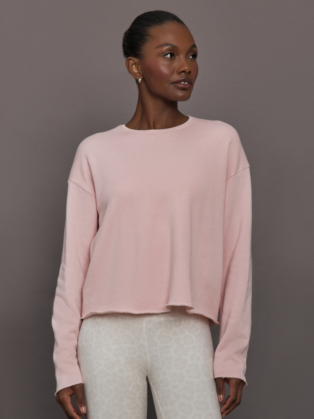 Women’s French Terry crew neck sweatshirt in lotus, front view on model.