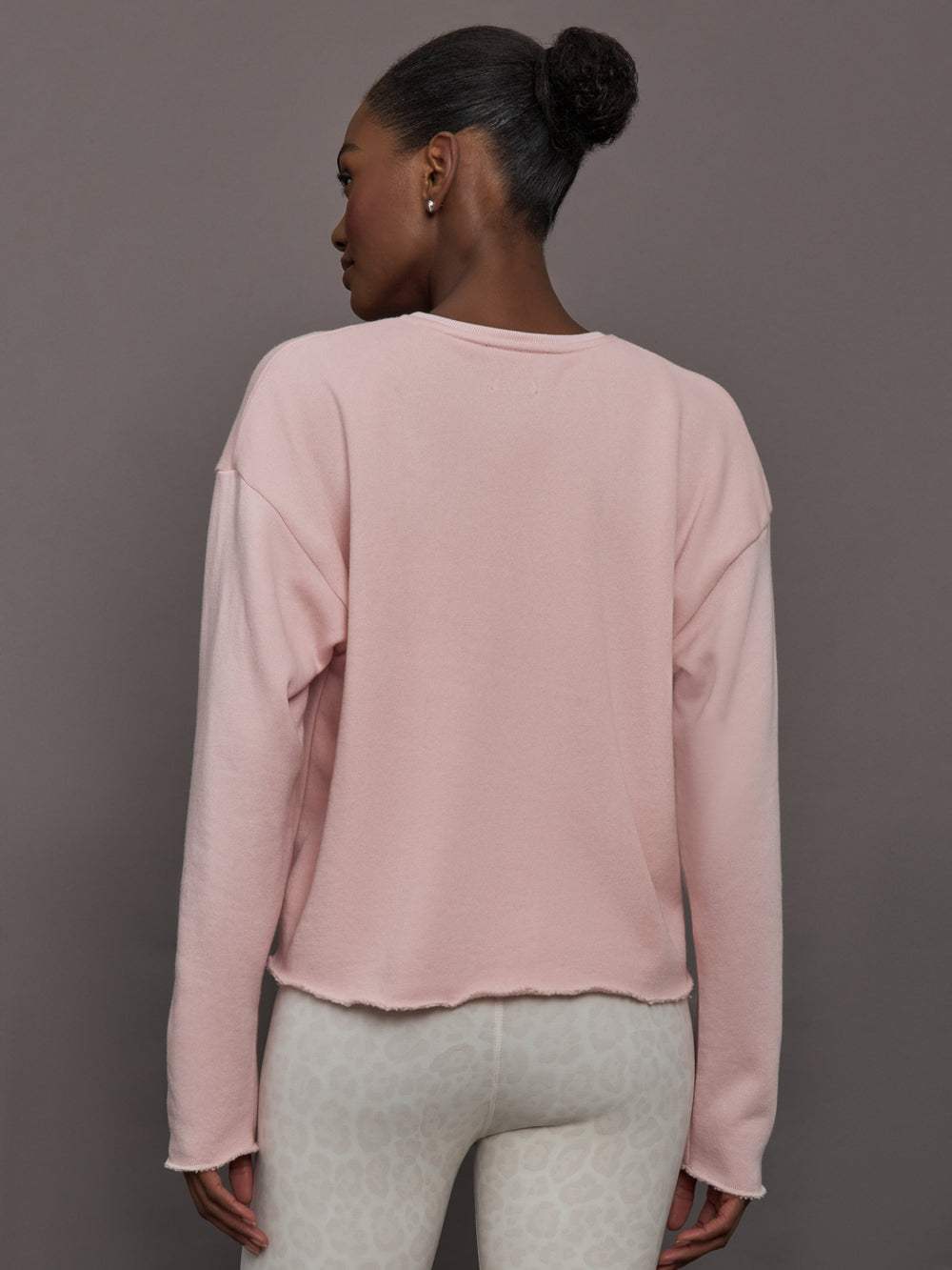 Back view of women’s lotus French Terry crew neck sweatshirt.