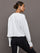 Back view of French Terry Crew Neck Sweatshirt in White on model.