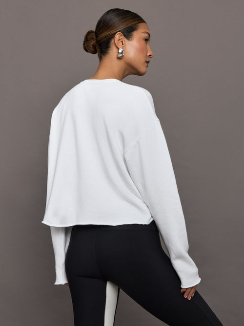Back view of French Terry Crew Neck Sweatshirt in White on model.