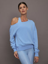 Model is wearing the Off Shoulder Sweatshirt in French Terry in Serenity shown from the front with off shoulder neckline.
