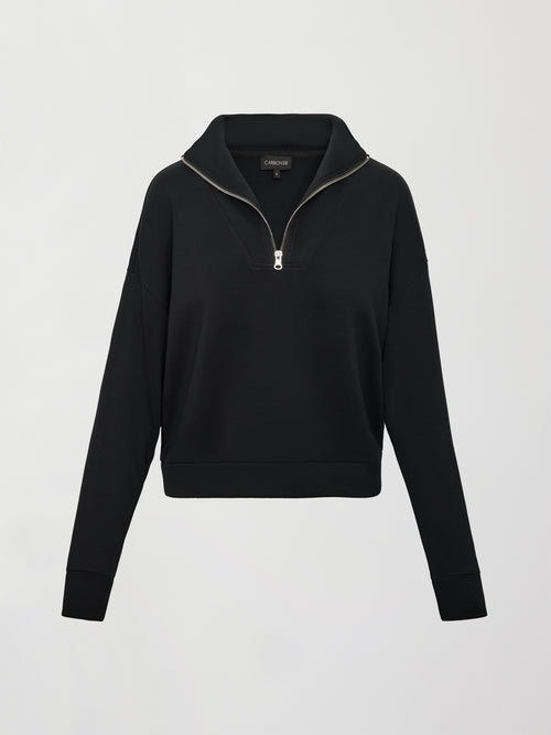 Flat lay of Interlock half zip pullover in black, front view.