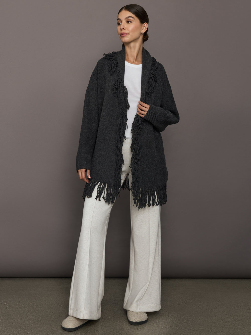 Full look with Tassel Shawl Collar Sweater in charcoal, styled with white top and wide-leg pants, front view.