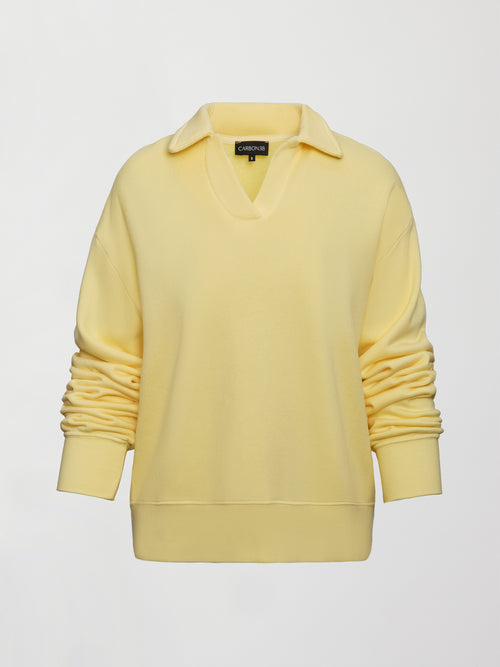 Flat lay of French Terry Johnny Collar Sweatshirt in Banana, front view.