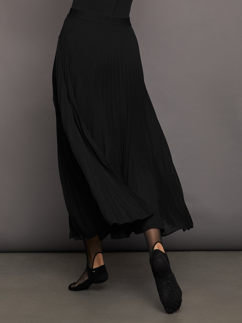 Long black pleated skirt