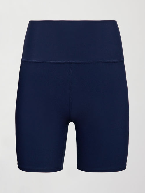 Flat lay of navy high-rise biker short with 6" inseam.