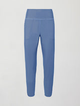 A pair of lightweight blue joggers with a wide waistband and pockets. 