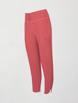 A buttery soft, high waisted, salmon pink colored pair of jogger sweatpants. 