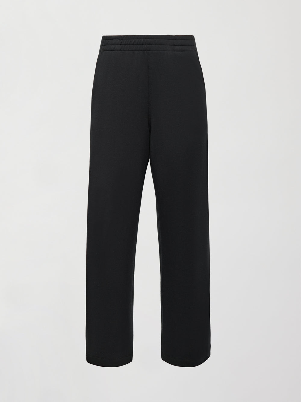 Flat lay of Interlock barrel leg pant in black, front view.
