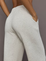 Model is wearing Interlock barrel leg pant in Moonbeam Heather, close-up pocket detail.