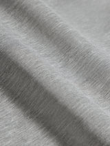 Close-up of heather grey ultrasoft fabric showing smooth texture and lightweight finish.