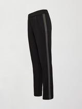 Scuba tuxedo pant in black, flat lay angled view.