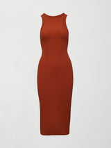 Model wears terracotta-colored, ribbed tank dress with a high neckline, sleeveless design, and a slim, body-hugging fit that extends right below the knee.