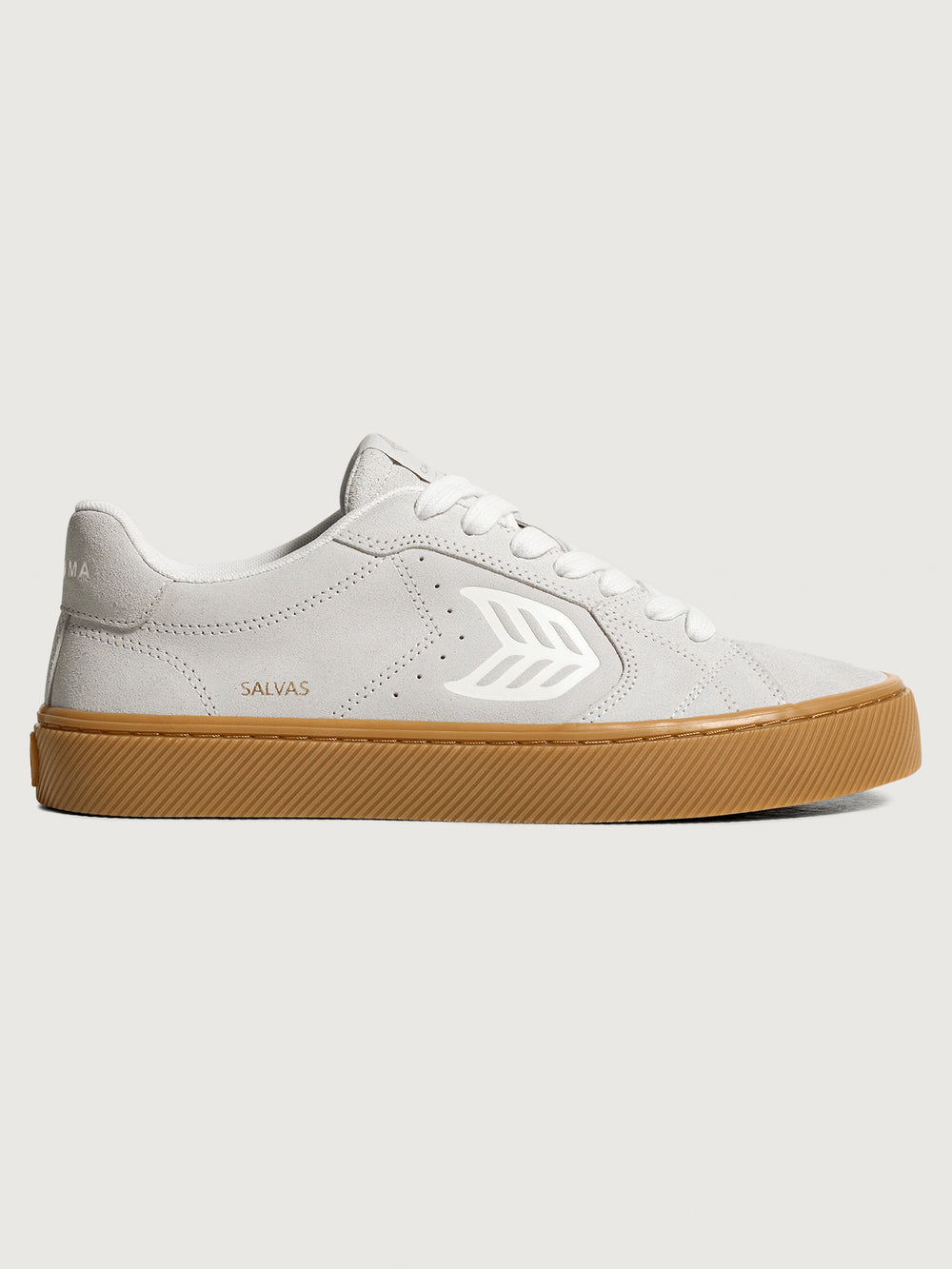 Suede white/light gray sneaker with light brown sole. 