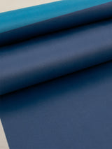 Close-up of Navy Aeris yoga mat in Navy and Blue showing smooth textured grip and layered color detail.