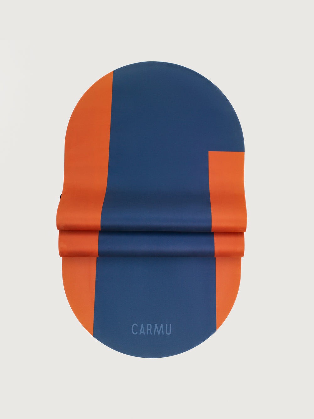 Echo yoga mat in Navy and Dark Red shown folded to highlight flexibility and bold geometric design.