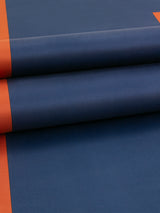 Close-up of Echo yoga mat in Navy and Dark Red showing smooth textured grip and colorblock detail.