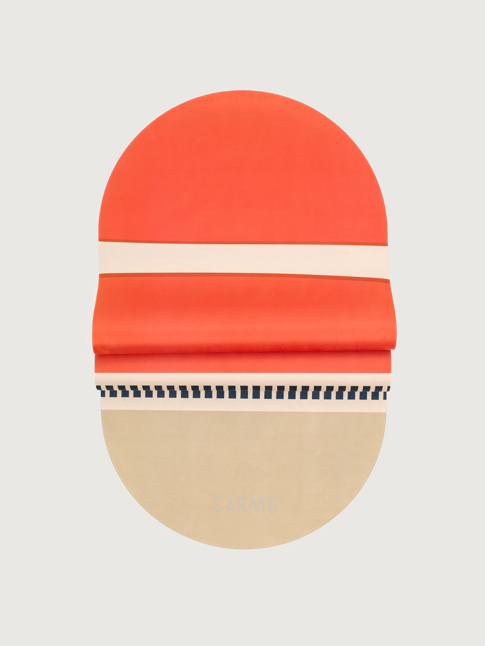 Groove yoga mat in Orange Geo Print shown folded to highlight flexibility and bold striped design.