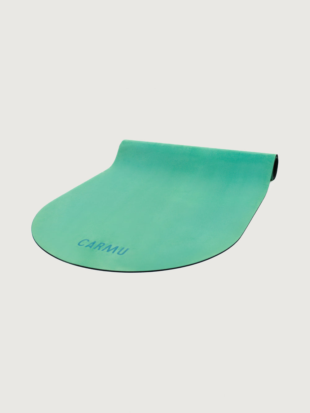 Angled view of Teal Gradient yoga mat partially unrolled with CARMU logo at front.