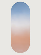 Aurora Yoga Mat in Blue Orange Gradient, flat lay full view.