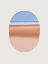 Aurora Yoga Mat in Blue Orange Gradient, rolled view showing ombré design.