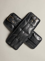 Flat lay of the Vegan Leather Weighted UWrap 1.5 Midnight Black, crossed strap detail.