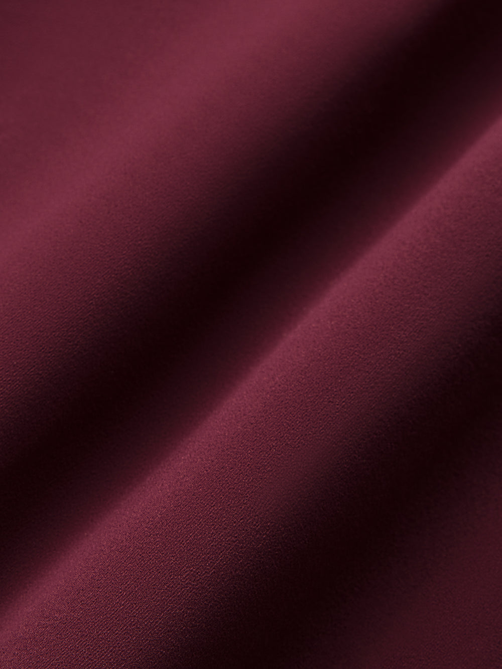 Model wearing Fig colored leggings with a high waist and pockets