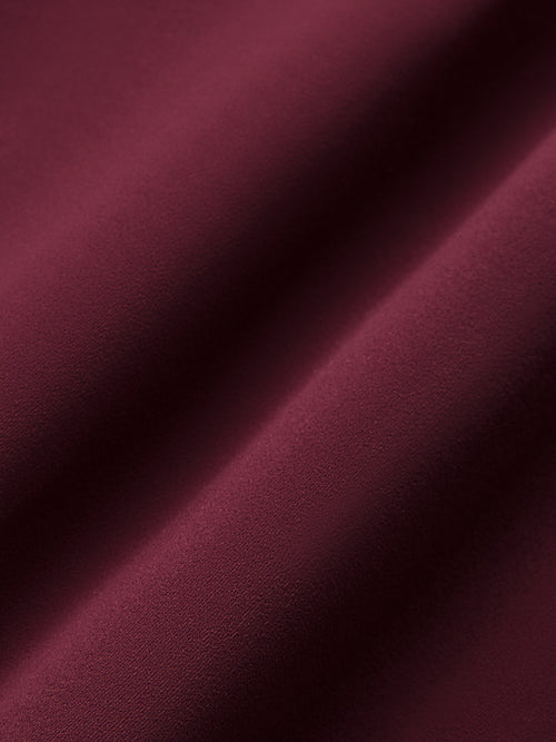 Model wearing Fig colored leggings with a high waist and pockets