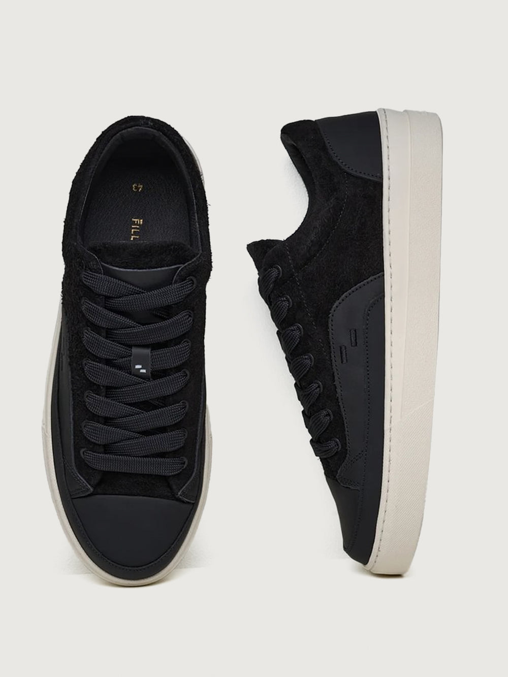 Filling Pieces Riviera Fuzz sneakers in black with suede and leather upper, lace-up front, and contrast white sole, top and side view.