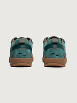 Filling Pieces Prism Peak sneakers in green with suede heel panels, perforated leather details, and gum sole, back view.