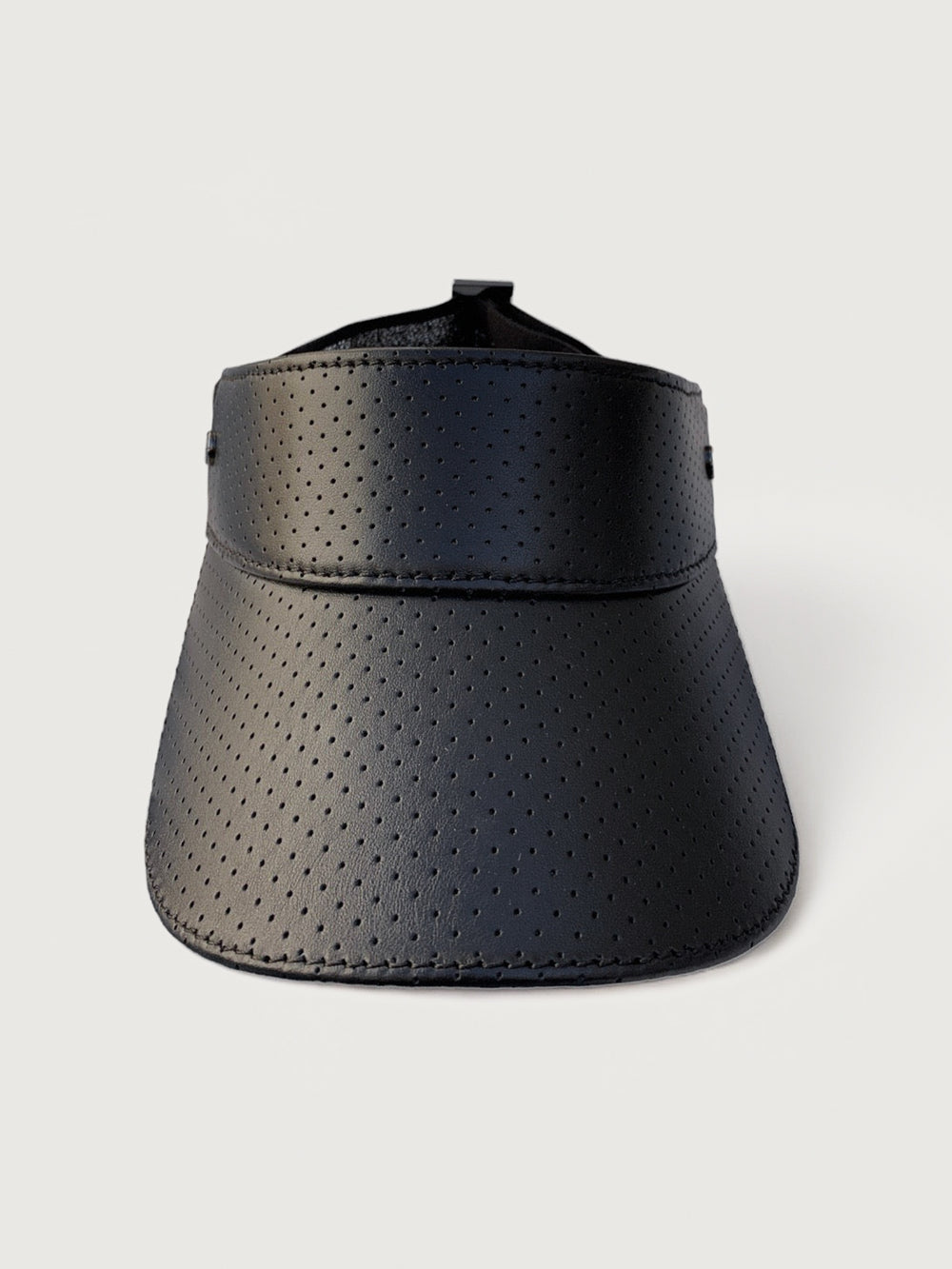 A black mesh textured shiny visor with a thick black strap that says Fenix Sportier. 