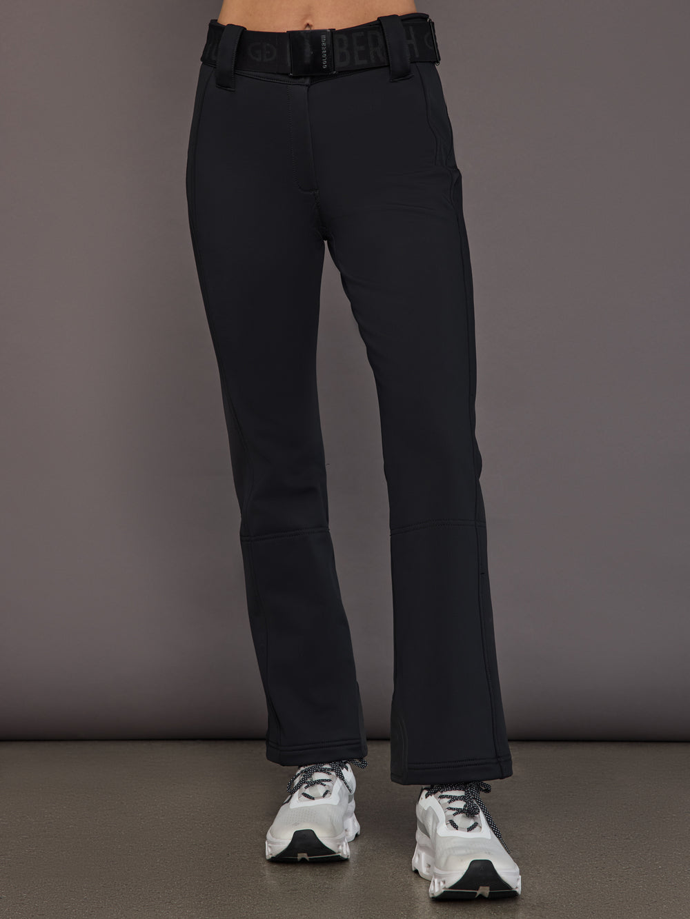 Black softshell ski pant on model, front view to mid calf.