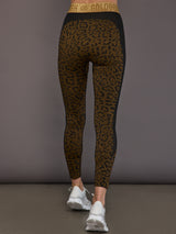 Back view of leopard leggings with gold waistband detail.
