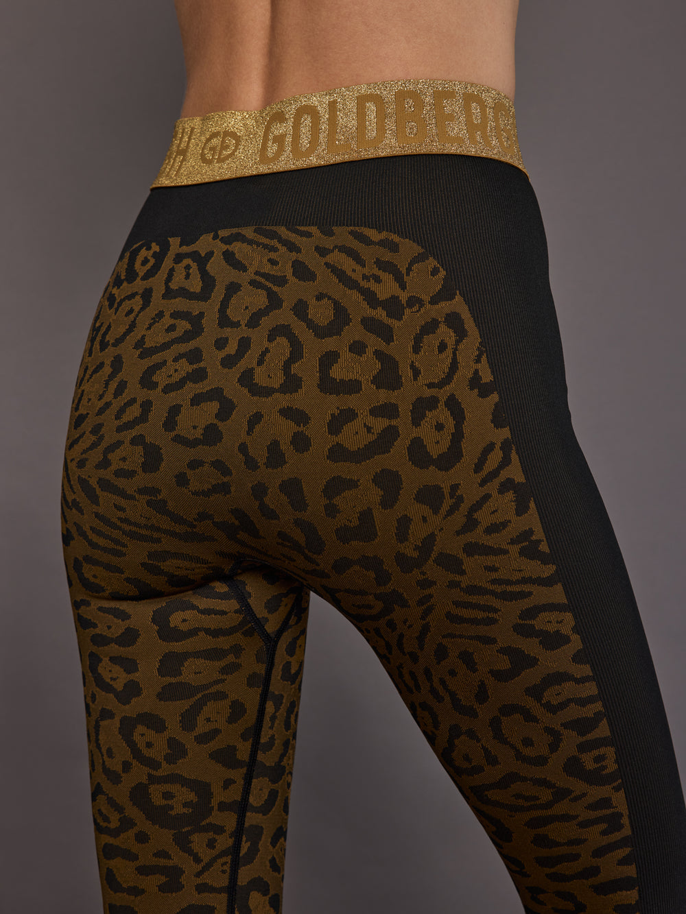 Close-up of leopard knit and waistband texture.