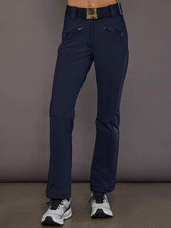 Model wearing navy softshell ski pants, front view.