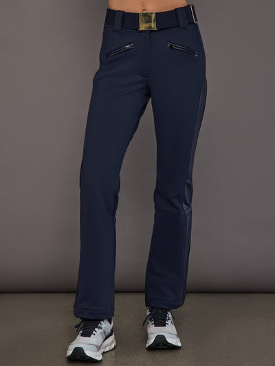 Model wearing navy softshell ski pants, front view.
